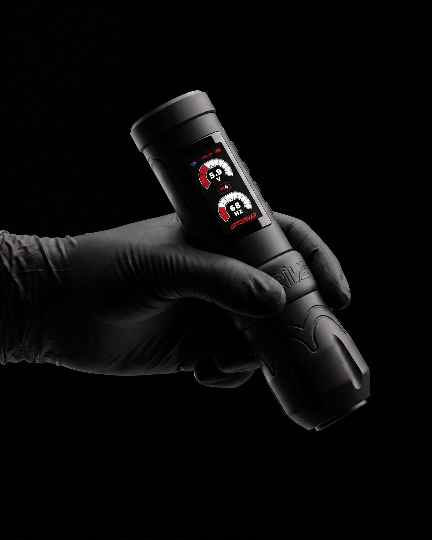 Nexo One held in a gloved hand